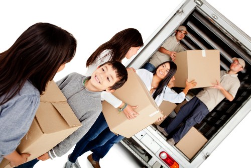 Removal van and moving team handling furniture removals in Tottenham Hale