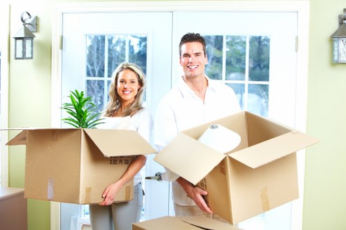Packed boxes and furniture ready for transport by removal companies in Tottenham Hale