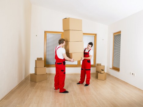 Boxes and furniture prepared for an apartment move in Tottenham Hale